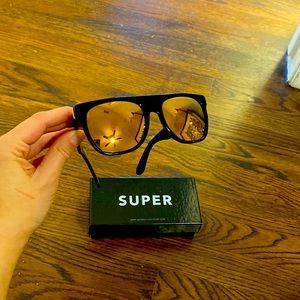 RETROSUPERFUTURE Sunglasses with Yellow tinted lenses